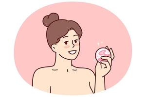 Woman with bath bomb in hands smiles as she prepares to take bath with aromatic substances vector