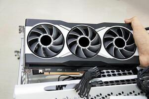 Side view of computer graphics card, computer equipment parts, computer assembler photo