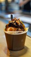 Chocolate Cinnamon Cake in a Small Cardboard Cup photo