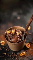 Chocolate Cinnamon Cake in a Small Cardboard Cup photo