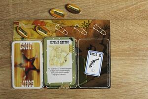 board card game bang with game cards and lost lives of the hero. Gameplay photo