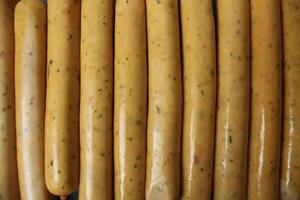 sausages in a package on a gray background. Background of food close-up. Vegans Vegetarian Food photo