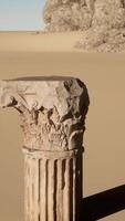 A stone column in the middle of a desert video