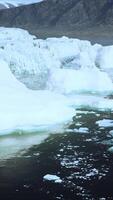 A mesmerizing view of icebergs floating on the water surface video