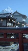 mountain range with lush trees and towering peaks in the backdrop of Japan video