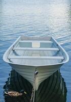 Rope for mooring a vessel is adhered to a pier and duck. High quality photo