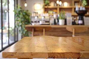 Modern co-working building relaxation lounge are or spacious bright cafe. Closeup to wooden table with chairs and blurred background with cafe area and barista serving organic drinks photo