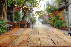 Empty natural wood table top in outdoors terrace, cafe. Empty backdrop on empty wooden table for food, drink, product with city street background photo