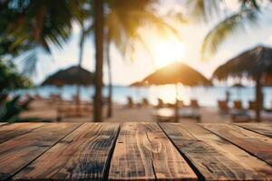Empty wooden table top with copy space for food drink product advertising with blurred summer resort beach bar restaurant background photo