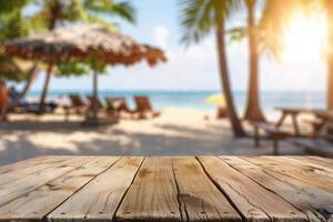 Empty wooden table top with copy space for food drink product advertising with blurred summer resort beach bar restaurant background photo