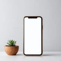 Mobile phone with white empty display screen mockup template photo