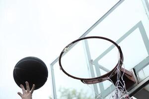Man playing basketball photo