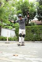 Man playing skateboard photo
