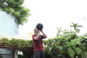 Man playing basketball photo