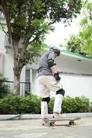 Man playing skateboard photo
