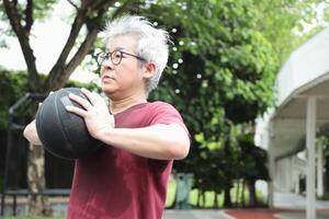 Man playing basketball photo