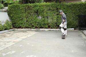 Man playing skateboard photo