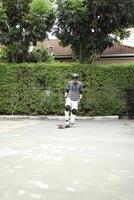 Man playing skateboard photo