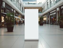 White blank roll up for mockup poster stands in shopping center background photo
