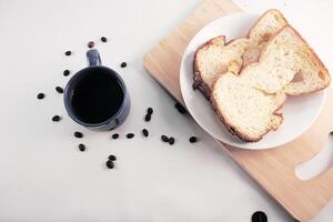 Ffresh bread and warm coffee inside white background photo