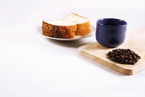 Ffresh bread and warm coffee inside white background photo
