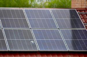 Photo collage of sunset and solar panel, photovoltaic