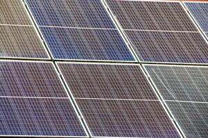 Photo collage of sunset and solar panel, photovoltaic