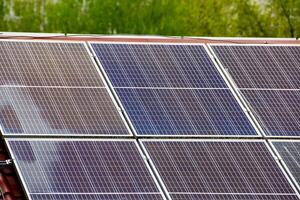 Photo collage of sunset and solar panel, photovoltaic