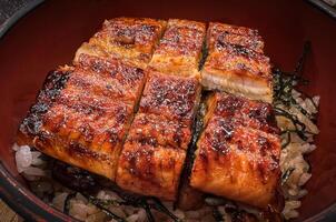 Delicious eel rice bowl in the evening photo