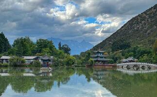 Scenic Chinese Garden With Lake Reflection. photo
