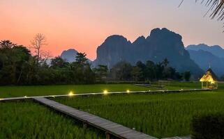 Sunset Over Serene Mountain Rice Fields. photo