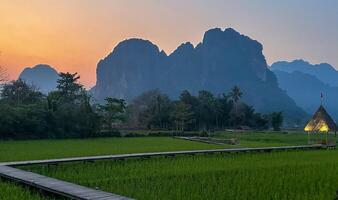 Sunset Over Serene Mountain Rice Fields. photo