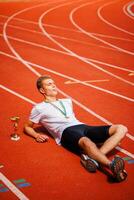 A track runner is standing at the starting line, getting ready for a quick sprint photo