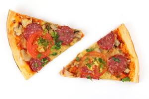 Sliced pizza on white isolate. photo