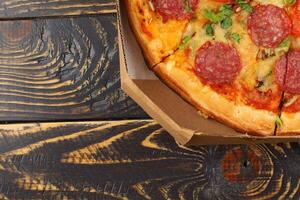 pizza in box open. Pizza in the in delivery box photo