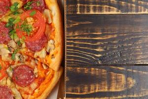 pizza in box open. Pizza in the in delivery box photo