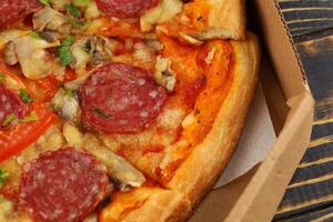 pizza in box open. Pizza in the in delivery box photo