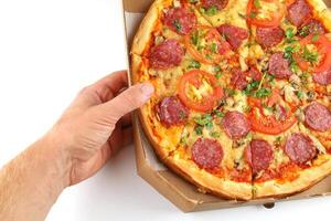 pizza in box open. Pizza in the in delivery box photo