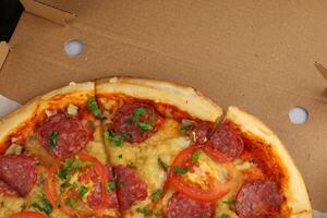 pizza in box open. Pizza in the in delivery box photo