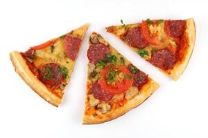 Sliced pizza on white isolate. Three slices of pizza photo