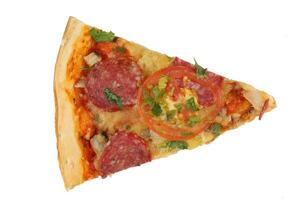 Sliced pizza on white isolate. One slice of pizza with tomatoes and cheese photo