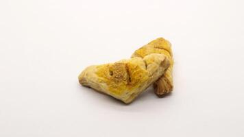 Chocolate pastry cake with a triangular shape photo