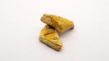 Chocolate pastry cake with a triangular shape photo