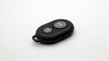 Bluetooth shutter remote for camera isolated photo