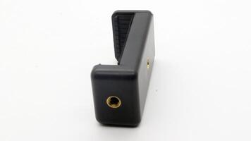 Tripod U holder for smart phone and camera isolated photo
