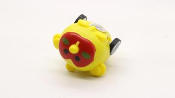 Cute yellow toy car isolated photo