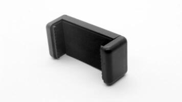 Tripod U holder for smart phone and camera isolated photo