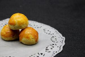 Homemade pineapple cakes or nastar Eid al-Fitr food isolated photo