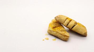 Chocolate pastry cake with a triangular shape photo