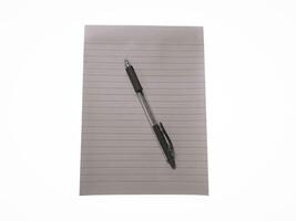 Top view of Black and white notebook with pencil placing over it isolated on white background photo